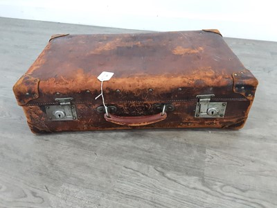 Lot 105 - A WOOD LINED LEATHER SUITCASE