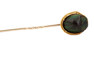 Lot 669 - A VICTORIAN SCARAB BEETLE STICK PIN