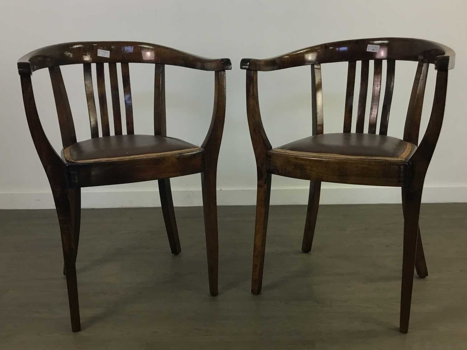 Lot 68 - A PAIR OF 20TH CENTURY ELBOW CHAIRS