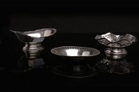 Lot 622 - SILVER BASKET of wavy circular form, pierced...