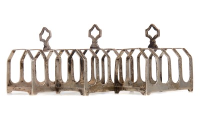 Lot 149 - A SET OF THREE GEORGE VI FOUR DIVISION SILVER TOAST RACKS