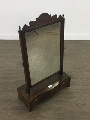 Lot 395 - A MAHOGANY DRESSING GLASS