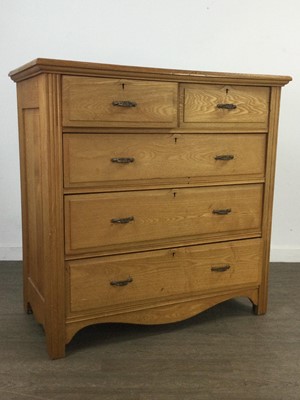 Lot 404 - AN OAK CHEST OF DRAWERS