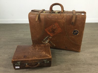 Lot 410 - A VINTAGE STITCHED LEATHER SUITCASE AND A SMALLER CASE