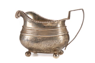 Lot 159 - A GEORGE III SILVER CREAM JUG