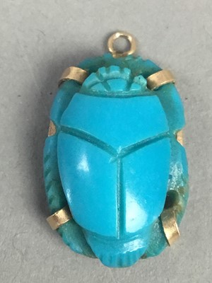 Lot 363 - A TURQUOISE SCARAB PENDANT ALONG WITH AN EMERALD AND DIAMOND PENDANT