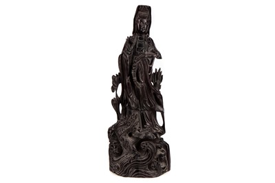 Lot 1136 - A CHINESE ZITAN CARVING OF GUANYIN