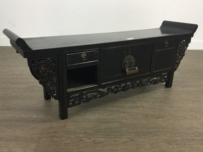 Lot 450 - A CHINESE EBONISED CABINET AND SIDE TABLE