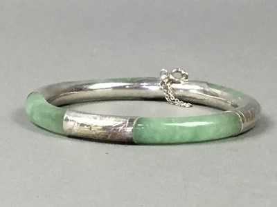 Lot 485 - A JADEITE AND SILVER BANGLE AND A BRACELET