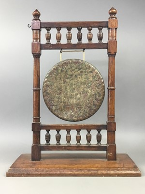 Lot 487 - A VICTORIAN TABLE GONG, WOODEN FLUTE AND ASH DISH