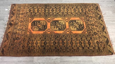 Lot 473 - AN AFGHAN RUG