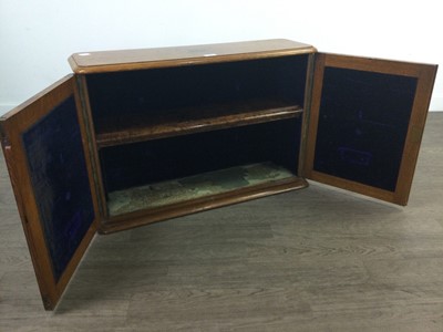 Lot 475 - AN OAK TWO DOOR CABINET