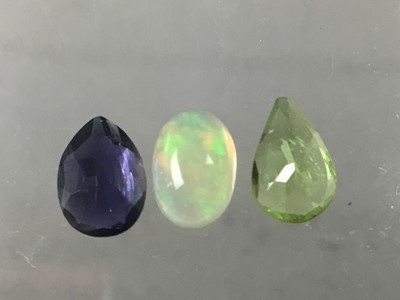 Lot 535 - **THREE CERTIFICATED UNMOUNTED GEMSTONES