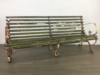 Lot 556 - A PAIR OF WROUGHT IRON AND WOODEN SLATTED GARDEN BENCHES