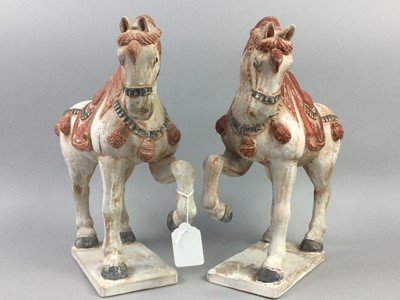 Lot 589 - A PAIR OF TANG STYLE EARTHENWARE HORSES