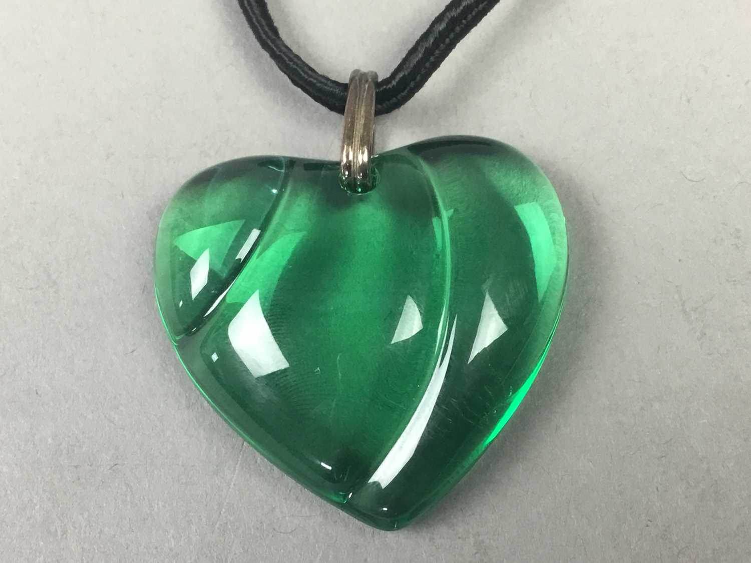 Lot 633 - A BACCARAT GREEN CRYSTAL HEART PENDANT