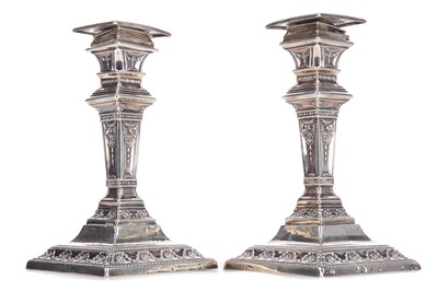 Lot 175 - A PAIR OF VICTORIAN SILVER CANDLESTICKS OF NEOCLASSICAL DESIGN