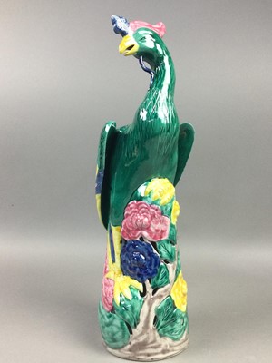 Lot 5 - A PAIR OF 20TH CENTURY CHINESE POLYCHROME PEACOCKS