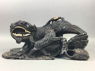 Lot 25 - A 20TH CENTURY CHINESE CARVED WOOD GROUP OF A FOE DOG AND PUP AND TWO OTHERS