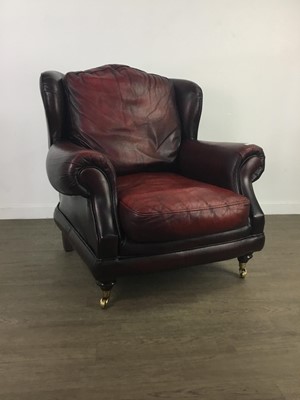 Lot 193 - AN OXBLOOD LEATHER WINGBACK ARMCHAIR