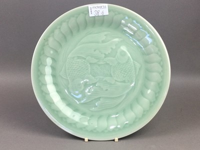 Lot 38 - AN EARLY 20TH CENTURY JAPANESE CLOISONNE ENAMEL CIRCULAR PLAQUE AND A CHINESE CELADON PLAQUE