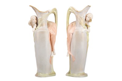 Lot 416 - A PAIR OF CONTINENTAL SECESSIONIST CERAMIC EWERS