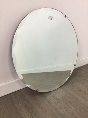 Lot 260 - A FRAMELESS CIRCULAR MIRROR