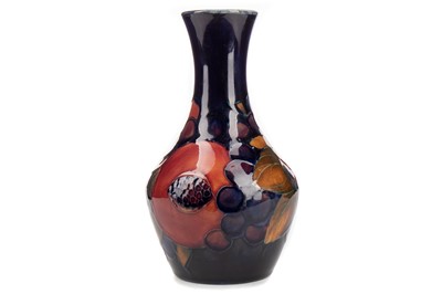 Lot 417 - A GRAPES AND POMEGRANATE  PATTERN VASE BY WILLIAM MOORCROFT