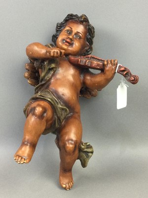 Lot 86 - A COMPOSITION HANGING ORNAMENT IN THE FORM OF A CLASSICAL CHERUB