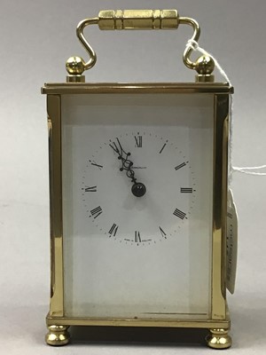 Lot 145 - A DOMINIUM BRASS CARRIAGE CLOCK AND ANOTHER CLOCK