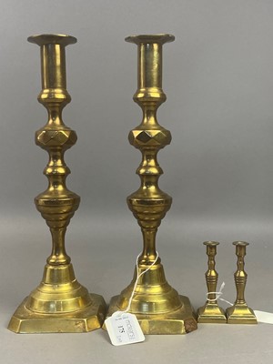 Lot 175 - A PAIR OF BRASS CANDLESTICKS AND TWO OTHER PAIRS