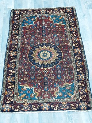 Lot 1180 - A PERSIAN HAMADAN RUG