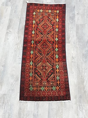 Lot 1181 - A PERSIAN BALUCHI RUG