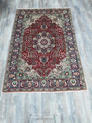 Lot 1188 - A PERSIAN TABRIZ RUG