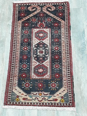 Lot 1185 - A PERSIAN BALUCHI RUG