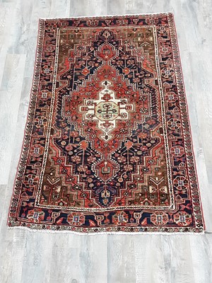 Lot 1178 - A PERSIAN HERIZ RUG