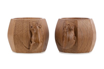 Lot 427 - A PAIR OF OAK NAPKIN RINGS ATTRIBUTED TO THE WORKSHIP OF ROBERT 'MOUSEMAN' THOMPSON