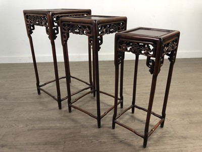 Lot 1172 - A CHINESE ROSEWOOD NEST OF THREE TABLES