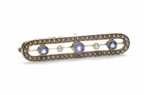 Lot 17 - EDWARDIAN BLUE GEM AND PEARL BROOCH set with...