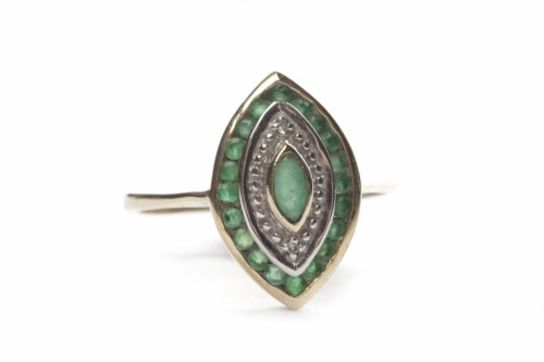 Lot 19 - EMERALD AND DIAMOND DRESS RING the marquise...