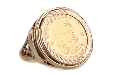 Lot 24 - A GOLD 1/10 KRUGERRAND RING DATED 1981