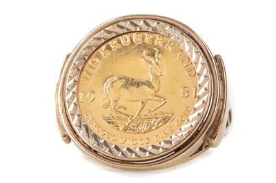 Lot 24 - A GOLD 1/10 KRUGERRAND RING DATED 1981