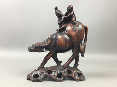 Lot 265 - A COLLECTION OF EUROPEAN AND EAST ASIAN CARVED WOOD FIGURES