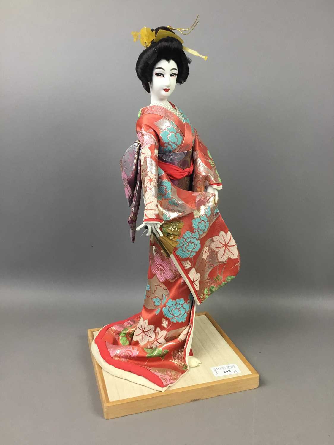 Lot 282 - A 20TH CENTURY JAPANESE KYUGETSU DOLL AND ANOTHER