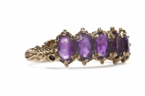 Lot 30 - AMETHYST DRESS RING set with five amethysts,...