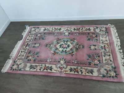 Lot 309 - A CHINESE BORDERED RUG