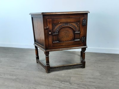 Lot 255 - AN OAK HALL CABINET