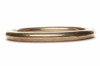 Lot 37 - LATE VICTORIAN FIFTEEN CARAT BANGLE of oval...