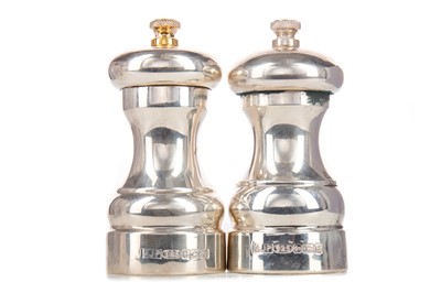 Lot 17 - A PAIR OF ELIZABETH II SILVER SALT AND PEPPER MILLS