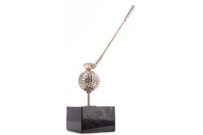 Lot 1506 - GOLFING INTEREST - A WHITE METAL AND MARBLE DESK WEIGHT